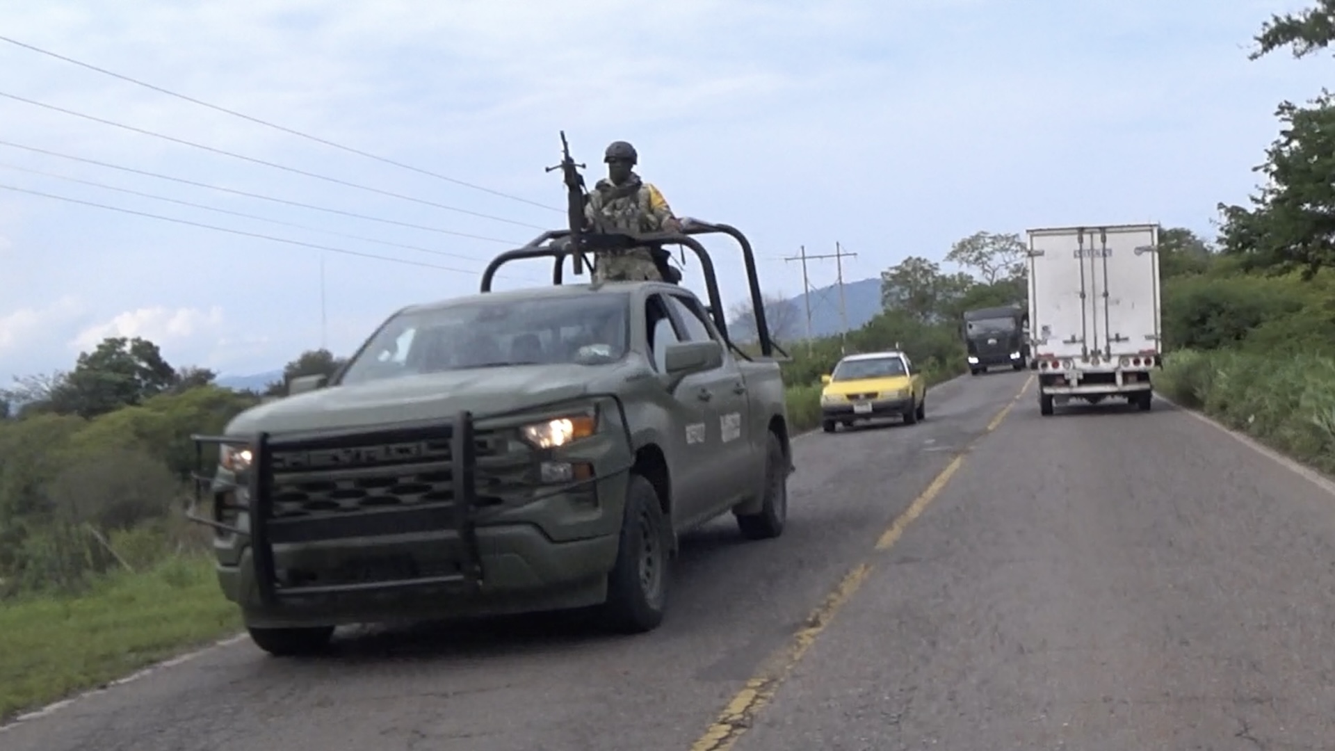 We ran across an army patrol. It's not uncommon to encounter these. Several cars, heavily armed.